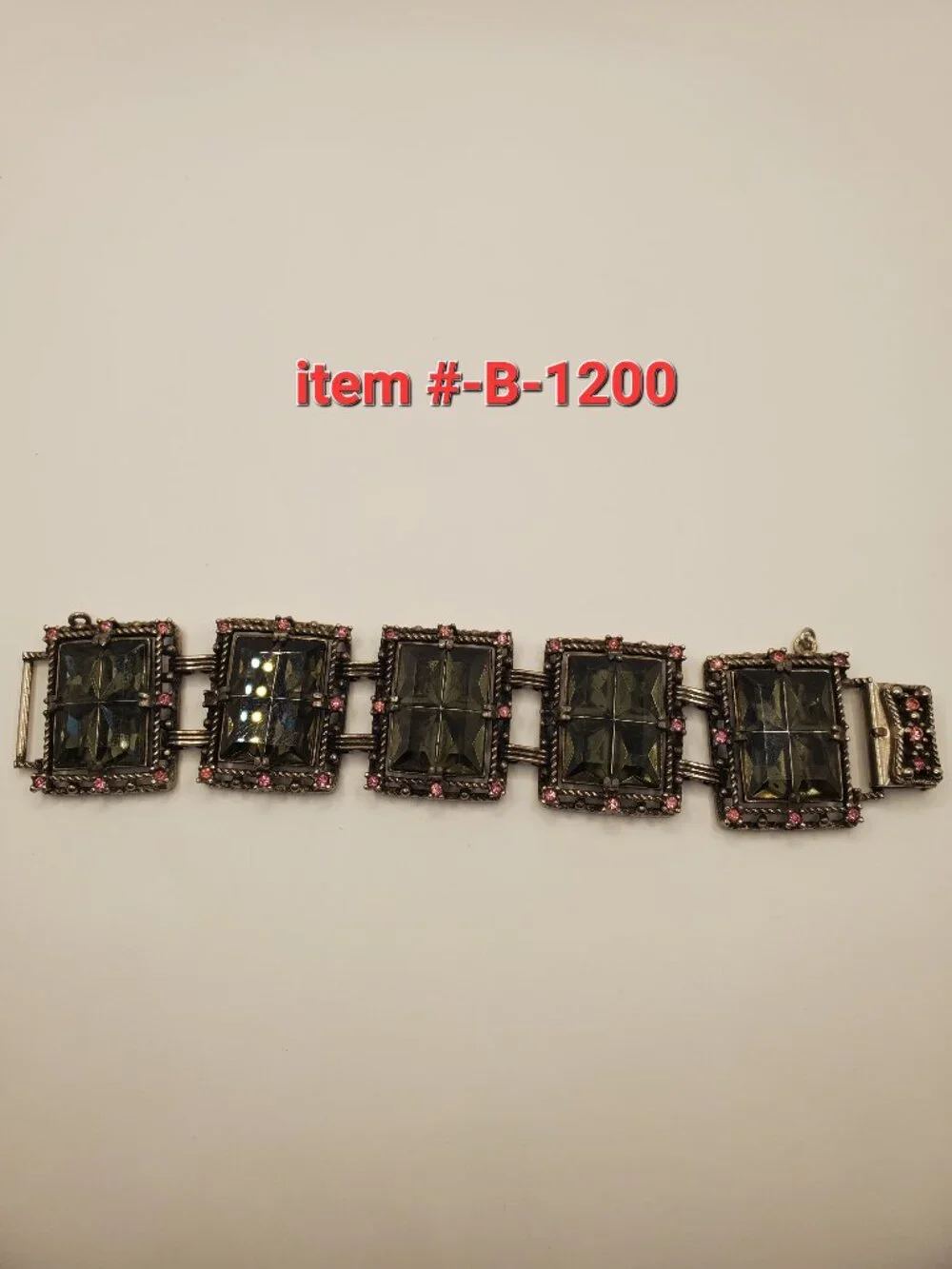 1 Silver -toned Bracelet, item # B-1200, wt. 78 grams.